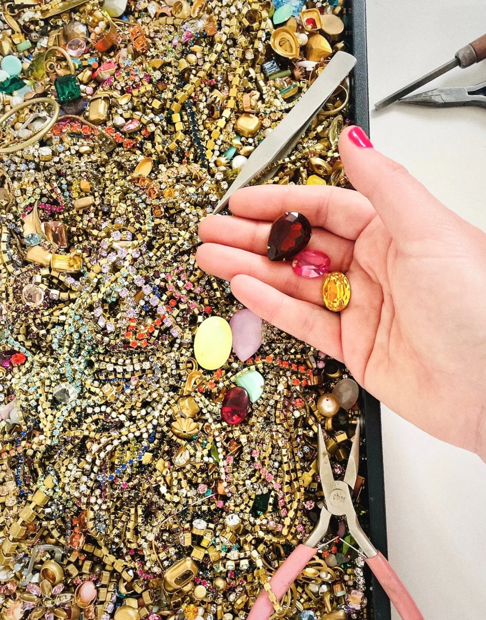 Hand selecting gems